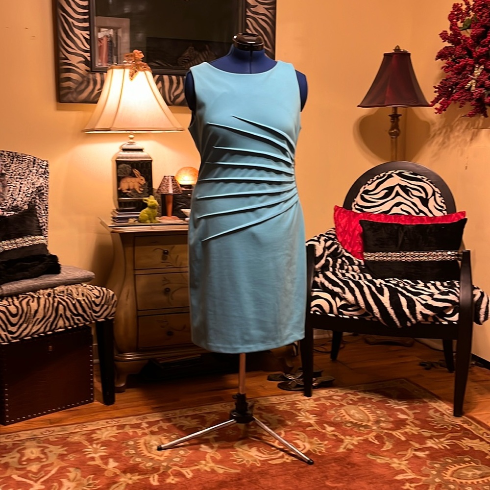 Turquoise dress with pleated waist detail. Just lovely.